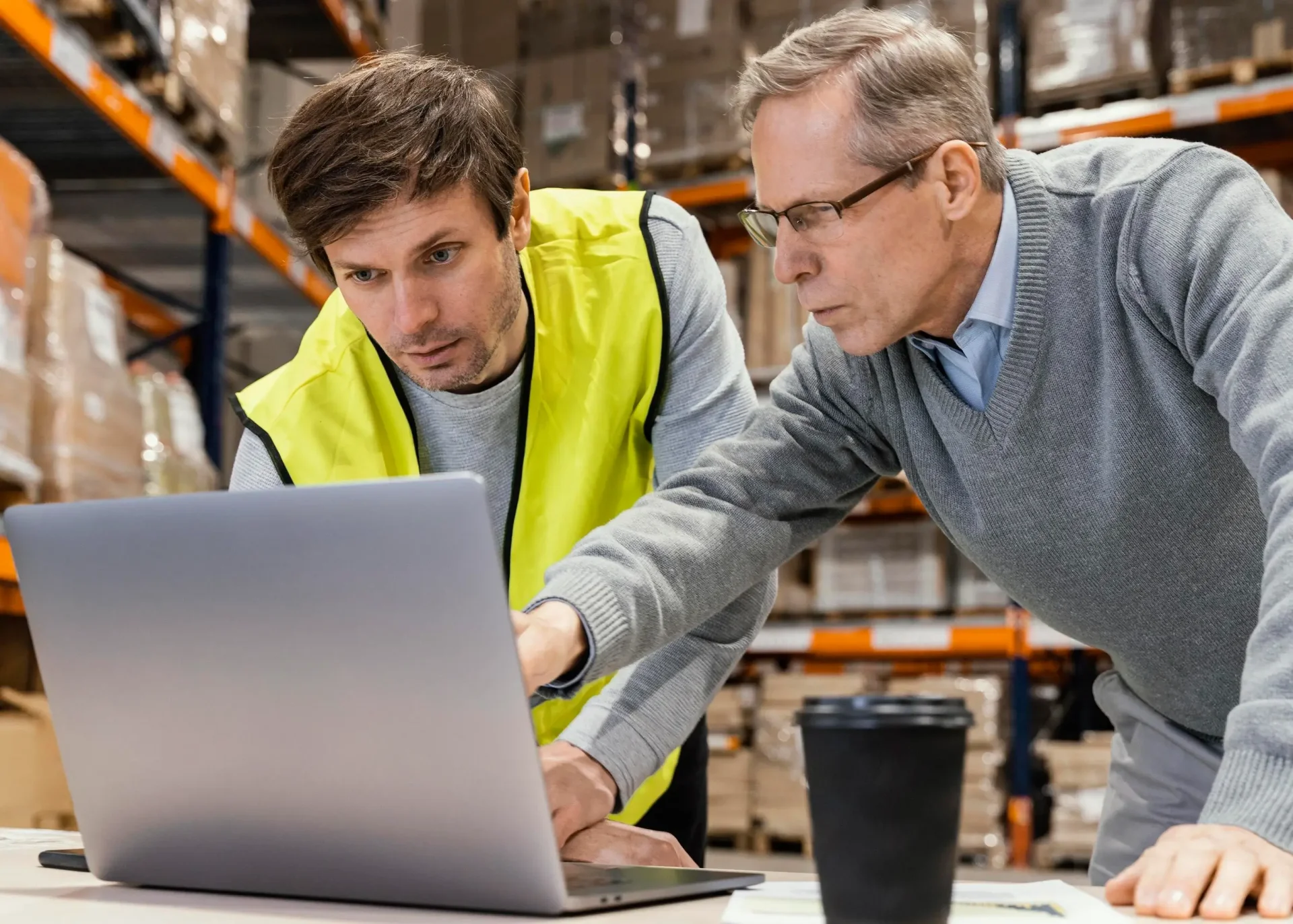 men-warehouse-working-laptop men-warehouse-working-laptop