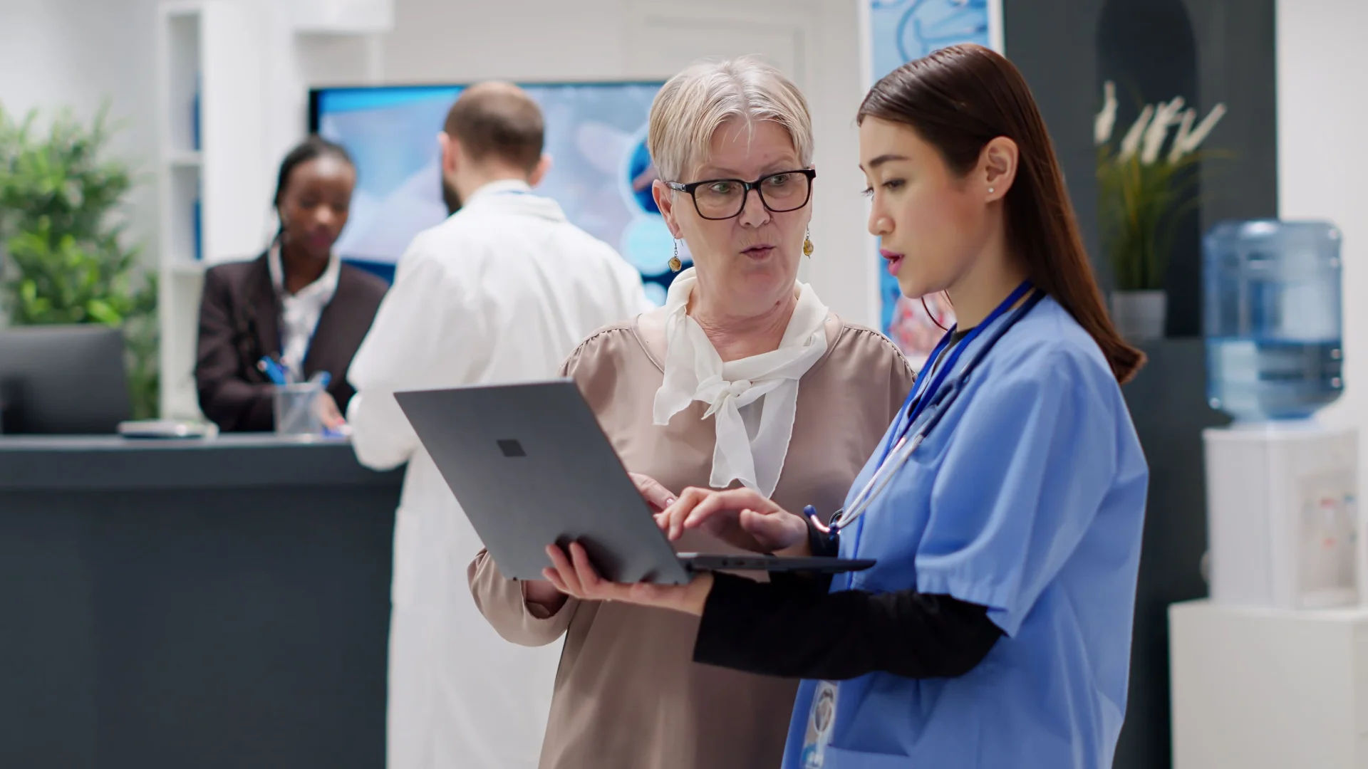 senior-woman-medical-assistant-analyzing-diagnosis-report-laptop senior-woman-medical-assistant-analyzing-diagnosis-report-laptop
